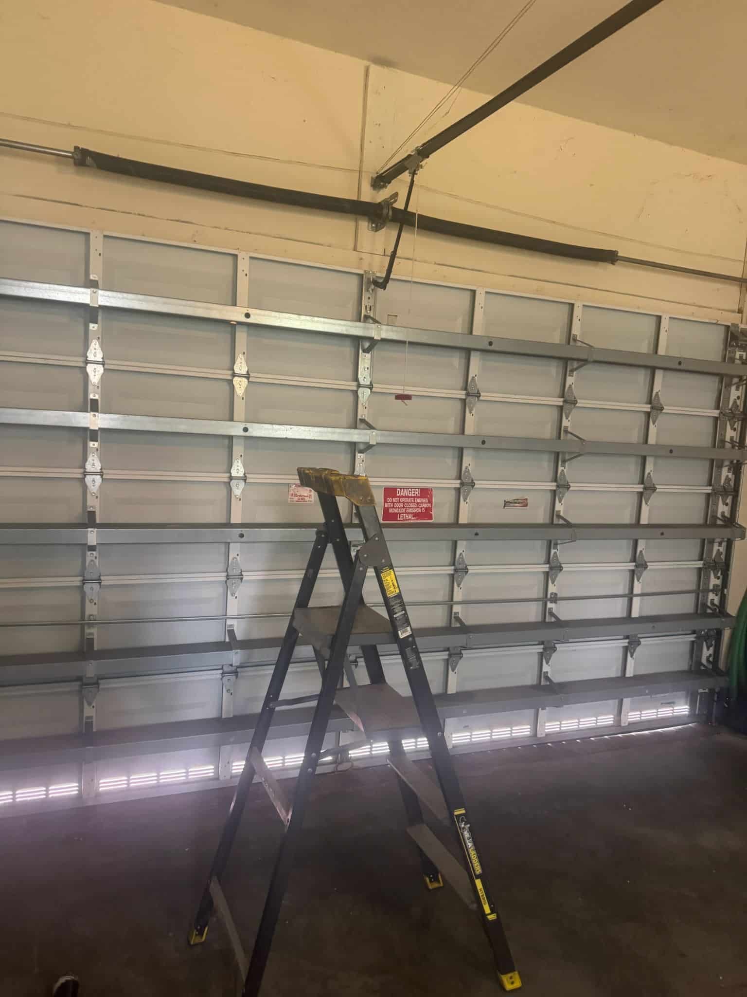 Garage Door Kingdom technician performing garage door installation in Sunrise, FL