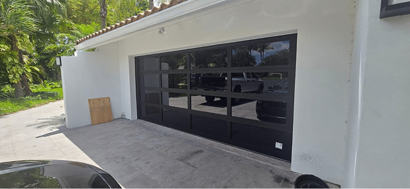 Full-view aluminum glass garage door installation Sunrise FL