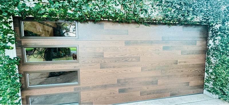 Luxury glass garage door installation South Florida Sunrise