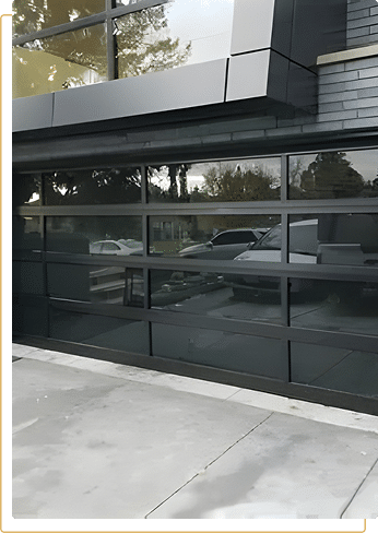 Luxury glass garage door installation in Sunrise, FL — full-view aluminum frame modern garage door for South Florida home
