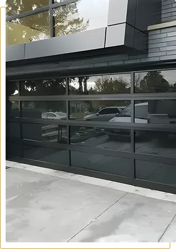 Luxury glass garage door installation in Sunrise, FL — full-view aluminum frame modern garage door for South Florida home